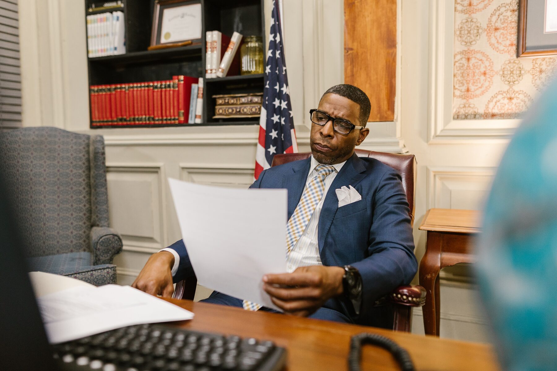 Legal professional reviewing official documents